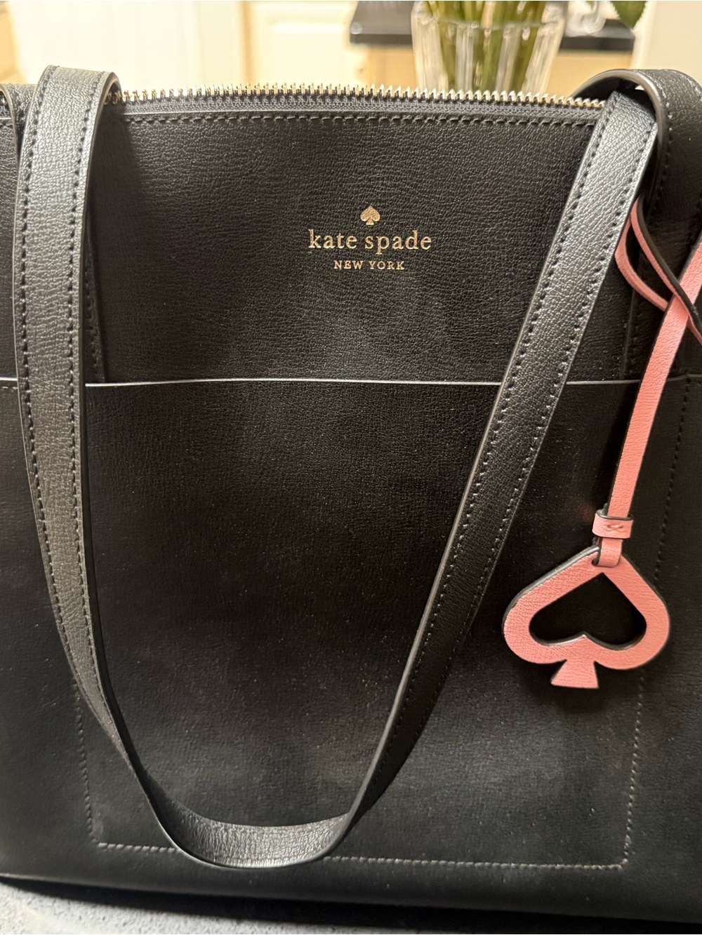 kate spade black leather tote with pink spade charm READ